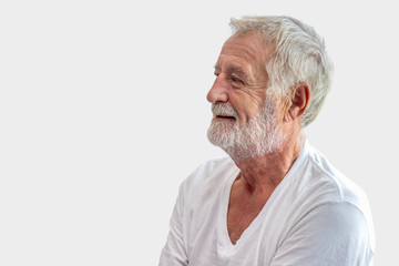 Senior elderly man in casual shirt isolated on grey background