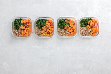 Wall Mural - Sauteed kale, quinoa and roasted sweet potato lunch box bowl