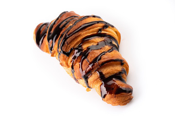 hot croissant with chocolate on white background