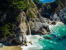 Aerial View Of Water Fall McWay Falls Julia Pfeiffer Burns Park Big Sur California. McWay Falls A Waterfall Empties Directly Into The Ocean.