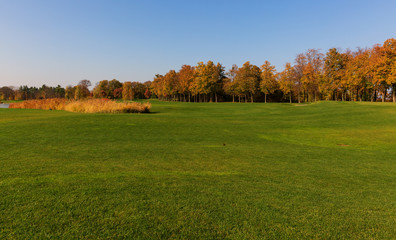 Autumn in the park and breathtaking view on the golf course.