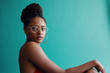 © Adam Perez - Studio portrait of stylish young woman wearing eyeglasses