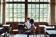 © Taishi Arashida - Side view of students in classroom