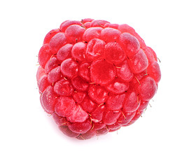 Fresh raspberry with leaves closeup isolated on white background