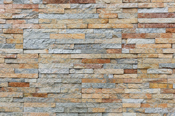 Wall Mural - Natural facade stone decoration quartzite background texture. modern granite stone wall