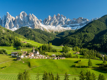 Italy , september 2017: Green valley Santa Maddalena village church, Val di Funes, Dolomiti Mountains