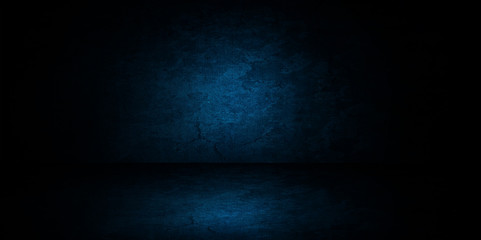Wall Mural - abstract image of studio dark blue room gradient background for interior decoration.