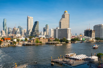 Wall Mural - Bangkok skyline and business skyscrapers at Chaopraya river