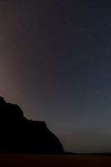 Wall Mural - Night sky under the cliffs in Portugal