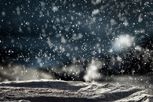 Christmas Background With Space For Advertising Products And Decorations. Snowy Glimmering And Shiny Winter Landscape With Falling Snowflakes And Snow Surface.