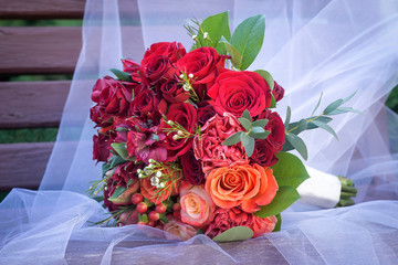 The most beautiful bridal bouquet of different flowers.