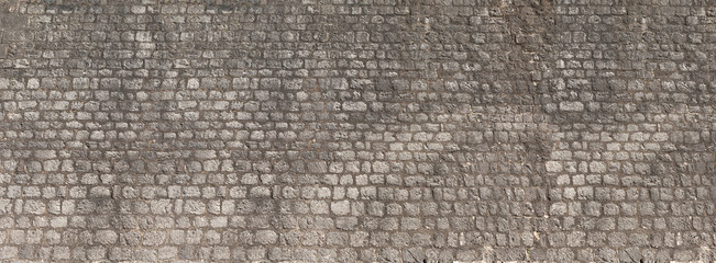 Wall Mural - Background of vintage brick stone wall panorama texture