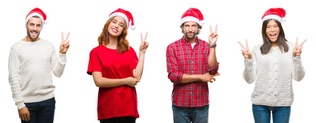 Sticker - Collage of group of people wearing christmas hat over isolated background smiling with happy face winking at the camera doing victory sign. Number two.