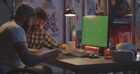 Video game developers discussing project
