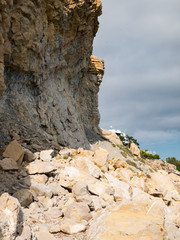 Wall Mural -  collapse of stones on vertical wall