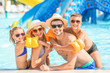 © Pixel-Shot - Happy family resting in aqua park