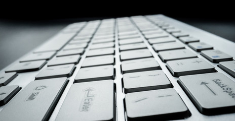 Wall Mural - close-up soft-focus laptop computer keyboard. programming and online marketing business concept.