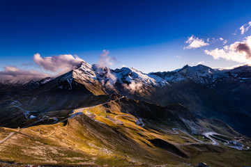 Poster - Panoramic View Over High Alpine Road and Snowy Mountains Peaks