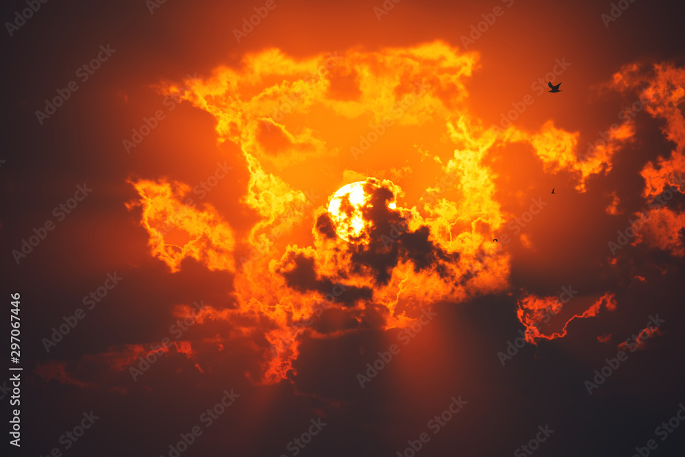 Sunset dramatic sky clouds with sunbeam - obrazy, fototapety, plakaty 