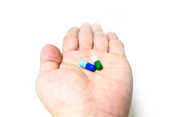 prescription of medicines. two pills on the doctor's hand