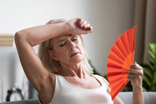 Tired Overheated Middle Aged Lady Wave Fan Complain On Heat