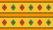 seamless background of ethno pattern in black, red and green on yellow stripes