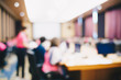 © themorningglory - Blurred people sitting in seminar hall room