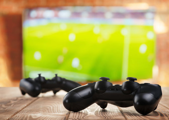 Gamepads on the table in the living room