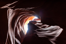 Low Angle View Of Dark Shadows And Light Sky At Upper Antelope Slot Canyon With Wave Shape Rock Sandstone In Page, Arizona