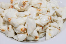 Close Up View Of Pile Of Fresh Steamed Crab Meat Without Shell And Ready To Eat On White Dish.