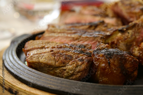Fotografía large Florentine steak fried meat in a pan