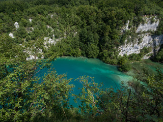 Wall Mural - Croatia, august 2019: Plitvice lakes, famous world tourist heritage sight, waterfall and green nature