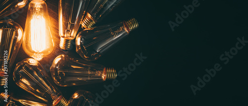 Cuadros en Lienzo Glowing bulb. Idea, uniqueness, leadership and different concept.