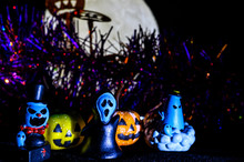 Halloween Still Life With Pumpkin Lights And Devil