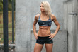 © nikolas_jkd - Fitness woman shaped abdominal outdoors. Athletic girl with flat belly, abs