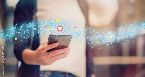 Fotomural Social media and digital online concept, woman using smartphone and show technology icon