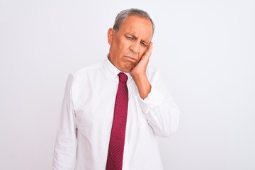 Sticker - Senior grey-haired businessman wearing elegant tie over isolated white background thinking looking tired and bored with depression problems with crossed arms.