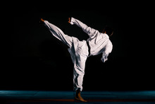 Portrait Of A Martial Arts Master On The Black Background