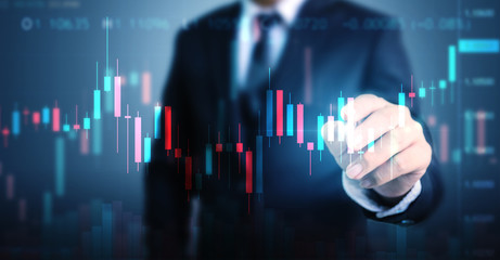 double exposure businessman pointing line dot graph. technical price candlestick chart graph and ind