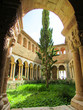 courtyard garden of a medieval Maria Collegiate Church in Alquezar, Aragon, Spain