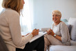 Geriatric psychology, mental therapy and old age concept - Senior woman patient and psychologist at psychotherapy session. Senior woman talking with female psychologist