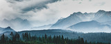 Fototapeta Góry - Mountain peaks in clouds and fog. Tatra Mountains, Poland.