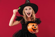 © Drobot Dean - Witch in carnival halloween costume