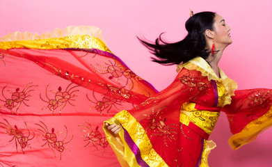 Red Gold lace of Chinese Traditional Costume Opera or South East Asia Reddish Dress in Asian Woman with decoration portrait in many poses under Studio lighting Pink background, collage group pack