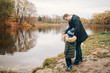 © serge - happy family in autumn park