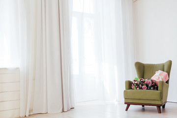 Wall Mural - green vintage chair in the interior of a white empty room