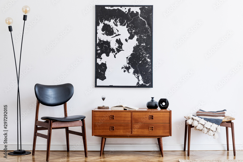 Stylish and retro living room with design vintage wooden commode, chair, footrest, black lamp and elegant personal accessories. Mock up poster map on the wall. Template. Vintage home decor.  - obrazy, fototapety, plakaty 
