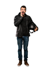 Wall Mural - Full-length shot of Biker man shouting and announcing something over isolated white background