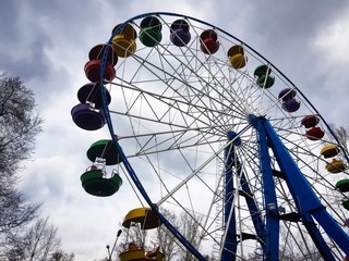 Ferris wheel on background of blue sky