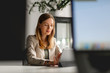 © Stock Rocket - Young woman typing on digital tablet in her office